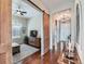 Inviting interior showcasing a sliding barn door, hardwood floors, and stylish decor at 4420 White Rock Dr, Broomfield, CO 80023