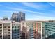 High-rise building in a modern city setting with mountain views at 1750 Wewatta St # 1521, Denver, CO 80202