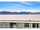 Stunning mountain views from a modern building rooftop at 1750 Wewatta St # 1521, Denver, CO 80202