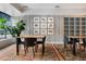 Community room with tables, chairs, and artwork at 1750 Wewatta St # 1521, Denver, CO 80202