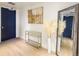 Bright entryway with full-length mirror and modern decor at 1750 Wewatta St # 1521, Denver, CO 80202