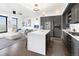 Modern kitchen with stainless steel appliances and an island at 1750 Wewatta St # 1521, Denver, CO 80202