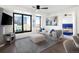 Spacious living room with city views and ample natural light at 1750 Wewatta St # 1521, Denver, CO 80202