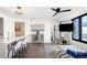 Open living area with hardwood floors, modern furniture, and city views at 1750 Wewatta St # 1521, Denver, CO 80202