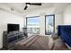 Spacious bedroom with city views and ample light at 1750 Wewatta St # 1521, Denver, CO 80202