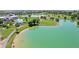 A bird's eye view of the community with ponds at 18079 E 108Th Pl, Commerce City, CO 80022