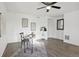 Bright bonus room with wood floors, a ceiling fan, modern decor and contemporary decor at 18079 E 108Th Pl, Commerce City, CO 80022
