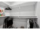 Well-organized closet with shelving and hanging racks for clothes and storage at 18079 E 108Th Pl, Commerce City, CO 80022