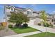 Attractive home featuring well-manicured lawn, solar panels and a classic two-story design at 18079 E 108Th Pl, Commerce City, CO 80022