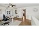 Spacious office featuring wood floors, a ceiling fan, and lots of natural light at 18079 E 108Th Pl, Commerce City, CO 80022
