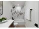 Stylish bathroom with a bathtub and marble accents at 2450 S Cherokee St, Denver, CO 80223