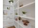 Walk-in pantry with modern white shelving at 2450 S Cherokee St, Denver, CO 80223