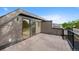Spacious rooftop deck with a sliding glass door, providing an ideal outdoor living space at 2450 S Cherokee St, Denver, CO 80223