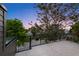 Stunning twilight views from this spacious rooftop deck, perfect for relaxing and entertaining at 2450 S Cherokee St, Denver, CO 80223