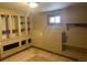 Basement with built-in shelves and cubbies at 1120 Dayton St, Aurora, CO 80010