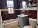 Cozy bathroom with a tiled shower and tub combo adjacent to a sleek vanity at 1120 Dayton St, Aurora, CO 80010