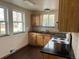The bright kitchen has plenty of cabinets and countertop space at 1120 Dayton St, Aurora, CO 80010
