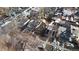 Aerial shot of a neighborhood showcasing single-Gathering homes with varying architectural styles and mature trees at 377 S Grant St, Denver, CO 80209