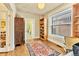 Cozy home office space with hardwood floors, built-in shelving, and a vintage cabinet at 377 S Grant St, Denver, CO 80209