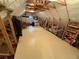Spacious attic with wooden beams, offering ample storage or conversion potential at 9716 Canon Dr, Sedalia, CO 80135