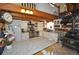 Bright kitchen boasts white cabinetry, granite countertops, stainless steel appliances, and a vintage stove at 9716 Canon Dr, Sedalia, CO 80135