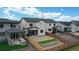 A wide shot of the backyard that shows a retaining wall and rock garden at 3625 Silver Rock Cir, Castle Rock, CO 80104