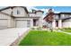Charming two-story home featuring a two-car garage, well-manicured lawn, and tasteful landscaping at 3625 Silver Rock Cir, Castle Rock, CO 80104