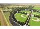 Aerial view of newly-constructed baseball fields, green space, and parking areas at 5249 Mt Arapaho Cir, Frederick, CO 80504