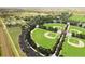 Aerial view of sport fields including 4 baseball fields, playground and parking at 5249 Mt Arapaho Cir, Frederick, CO 80504