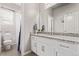 Bright bathroom with granite countertops, modern fixtures, and a walk-in shower at 6990 E 132Nd Pl, Thornton, CO 80602