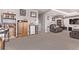 Spacious bonus room featuring neutral walls and carpet, with ample space for different activities at 6990 E 132Nd Pl, Thornton, CO 80602