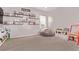 Bonus room with bean bag chair and play area at 6990 E 132Nd Pl, Thornton, CO 80602