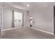 Large bonus room featuring neutral walls and carpet, with a dedicated play nook at 6990 E 132Nd Pl, Thornton, CO 80602