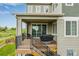 Covered deck and railing provides stunning outdoor views; includes barbecue for outdoor enjoyment at 6990 E 132Nd Pl, Thornton, CO 80602