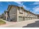 Exterior view of townhome with private garage parking and well-maintained landscaping at 2800 W Centennial Dr # I, Littleton, CO 80123