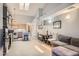 Bright living room featuring neutral tones, sleek fireplace, and cozy seating area for relaxing and entertaining at 2800 W Centennial Dr # I, Littleton, CO 80123