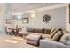 Inviting living room showcasing the plush sectional sofa, neutral decor, and a cozy seating arrangement at 2800 W Centennial Dr # I, Littleton, CO 80123