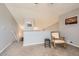 Inviting living room featuring vaulted ceiling, neutral tones, and plush carpeting at 2800 W Centennial Dr # I, Littleton, CO 80123