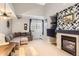 Spacious living room features a modern fireplace, neutral tones, and large windows for natural light at 2800 W Centennial Dr # I, Littleton, CO 80123