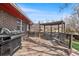 Backyard deck features a grill, dining area with gazebo and views of the property at 8320 W Harvard Dr, Lakewood, CO 80227