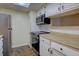 Well-equipped kitchen featuring stainless steel appliances and light colored wood cabinetry and countertop at 3494 S Eagle St # 202, Aurora, CO 80014