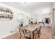 Open dining space adjacent to a kitchen and living area, perfect for entertaining guests at 3865 Independence Ct, Wheat Ridge, CO 80033