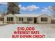 Charming ranch-style home with a well-maintained front yard and snow covered lawn at 3865 Independence Ct, Wheat Ridge, CO 80033
