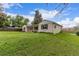 Charming one-story home featuring a well-manicured lawn and inviting covered porch at 3865 Independence Ct, Wheat Ridge, CO 80033