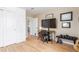 Home office offers hardwood floors, closet, and a bright view of the backyard at 3865 Independence Ct, Wheat Ridge, CO 80033