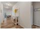 Inviting foyer featuring hardwood floors, neutral walls, and decoratively appointed console table at 4738 River Highlands Loop, Elizabeth, CO 80107