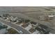 A suburban street features meticulously built two-story homes with driveways against a prairie landscape backdrop at 4738 River Highlands Loop, Elizabeth, CO 80107