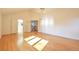 Bright living room with hardwood floors, french doors and high ceilings at 8055 S Zephyr Way, Littleton, CO 80128