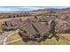 Scenic aerial of home showcasing spacious layout, private patio, landscaping, and mountain views at 10441 W Remington Dr, Littleton, CO 80127