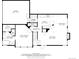 Detailed first-floor plan of a home showing the layout of rooms including the kitchen, living room, and bedrooms at 10441 W Remington Dr, Littleton, CO 80127